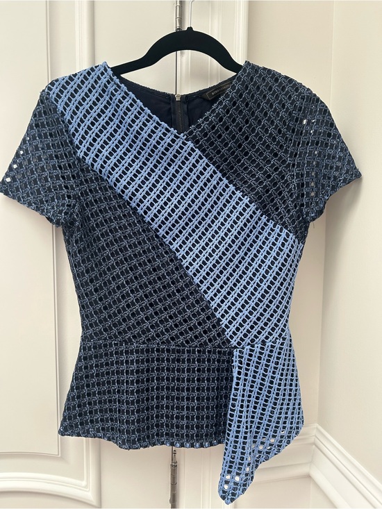 BCBGMaxAzria Tops - BCBGMaxAzria Navy and Light Blue Asymmetric Lace Peplum Top